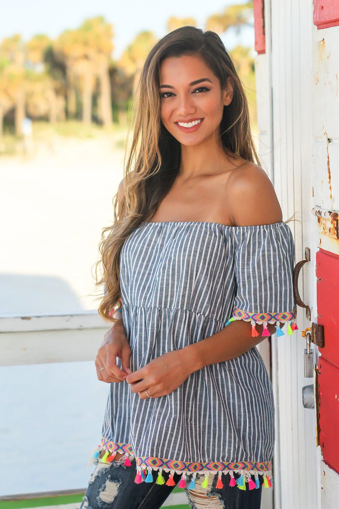 Blue and White Striped Top with Tassel Detail