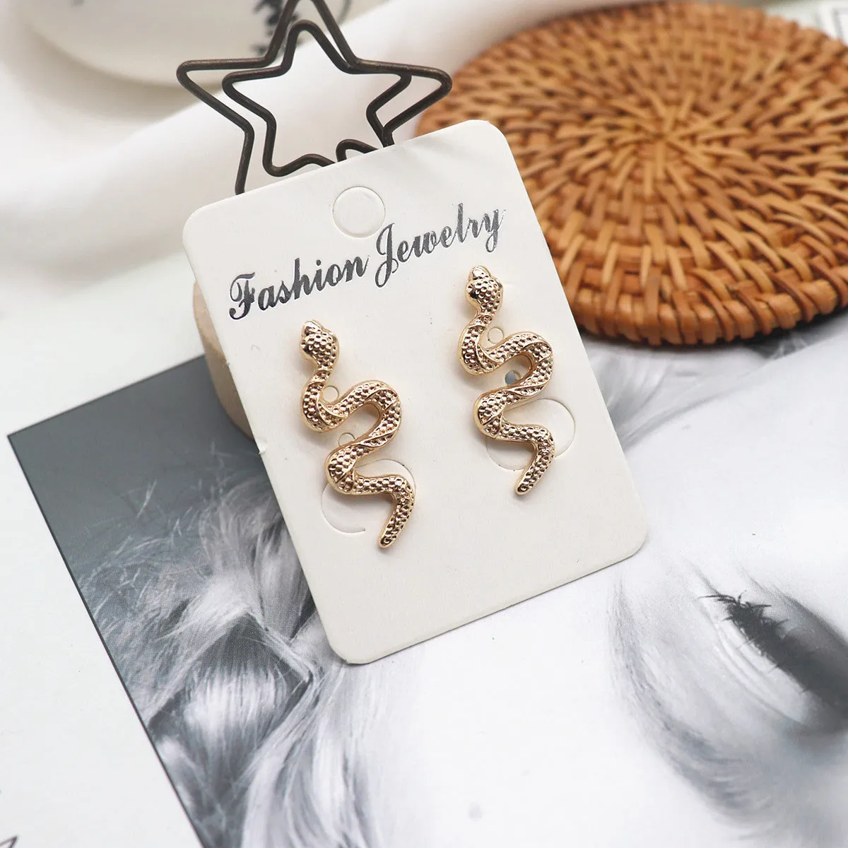 Little snake girl temperament earrings