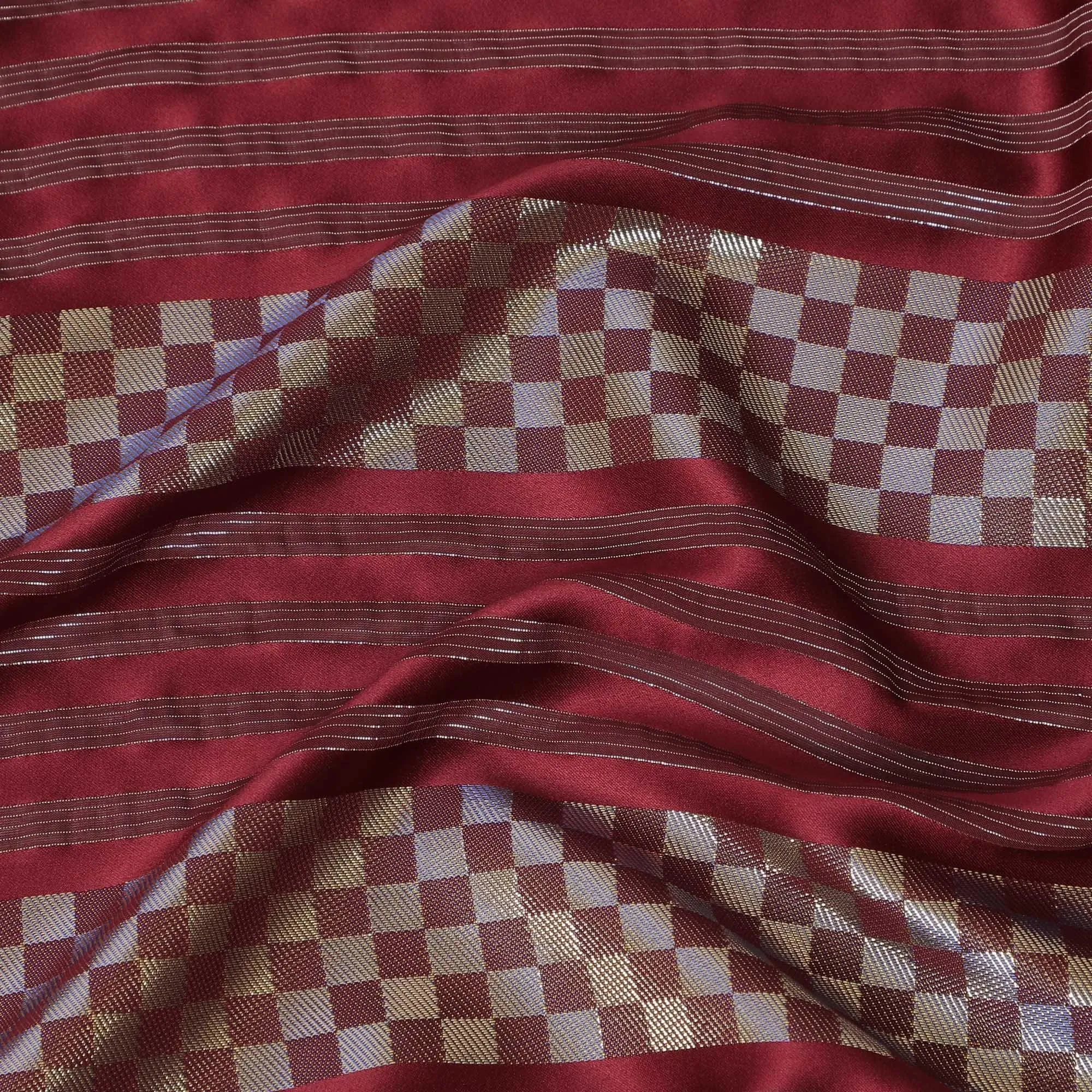 Maroon synthetic crepe fabric with gold metallic lurex weave in stripe design-D15383